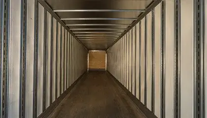 Empty interior of a clean, food-grade truck trailer