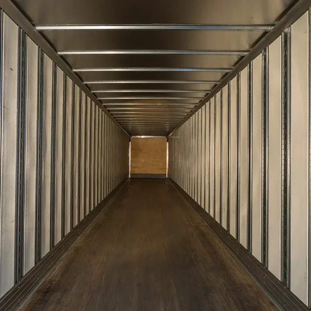 D. OTHERWISE: Inside of an empty, clean semi-trailer interior