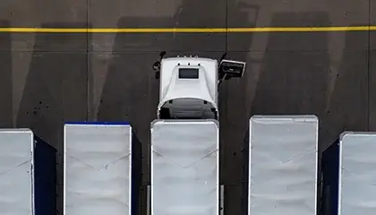 White truck attached to trailers from above